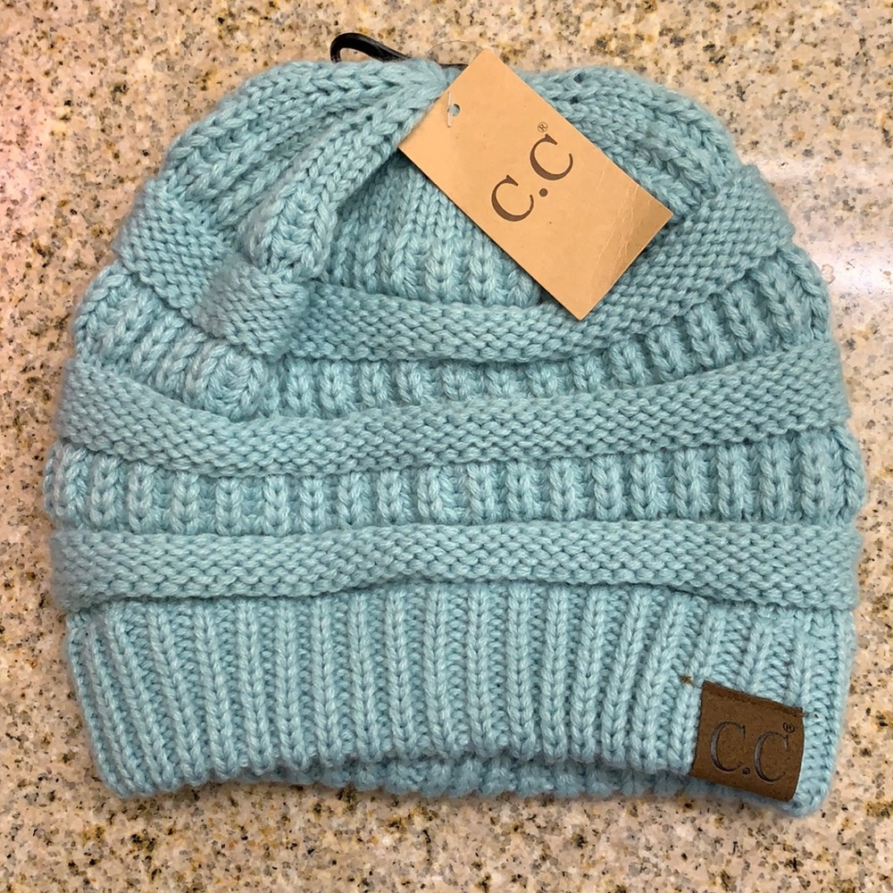 Mint (color) CC beanie. New with tags. Perfect condition.